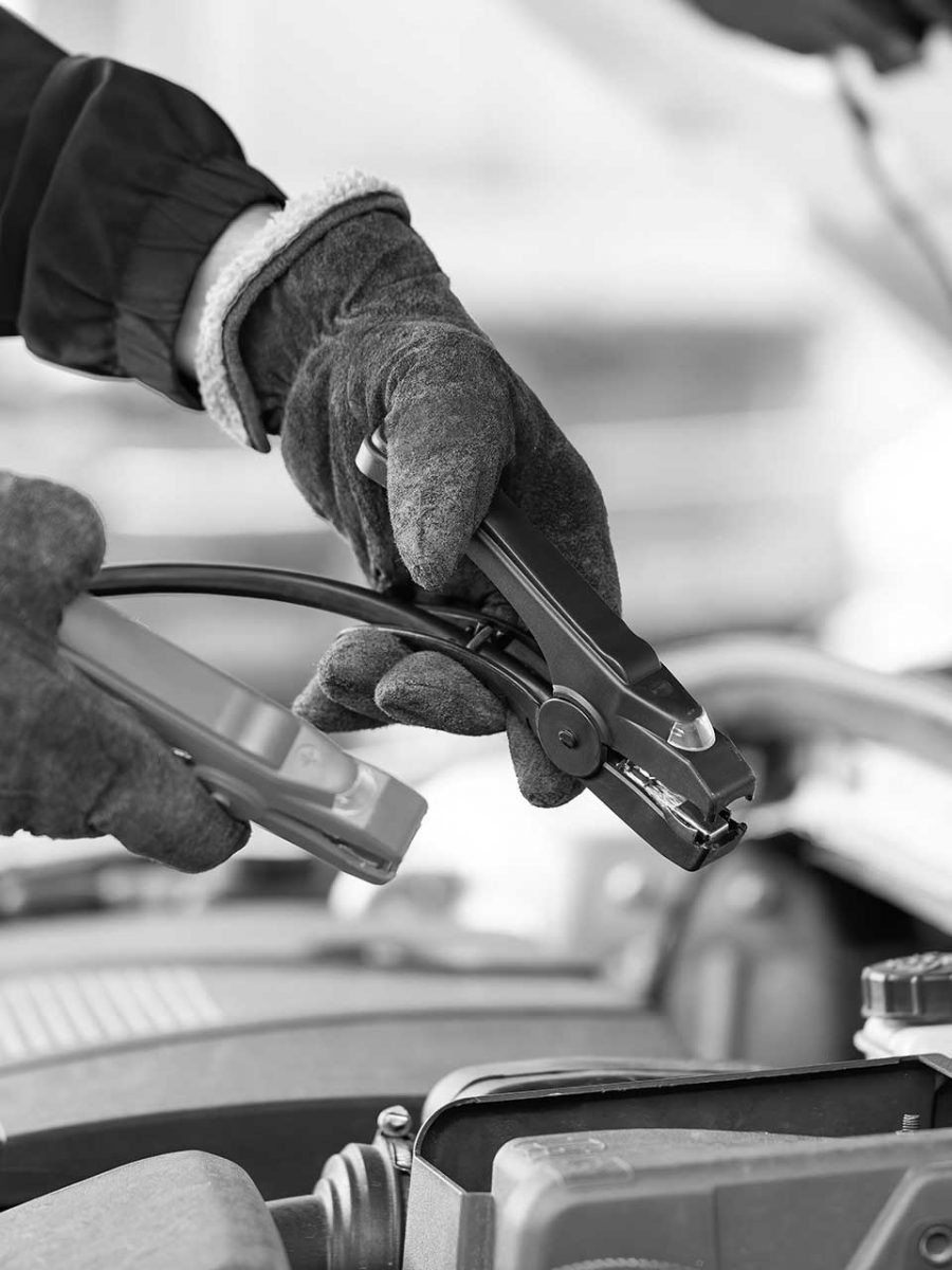 human-trying-to-start-engine-with-jumper-cables-in-7JB8JZ5a.jpg